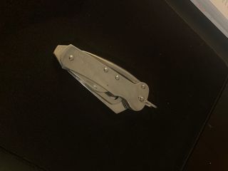 Navaja multiusos de acero inoxidable