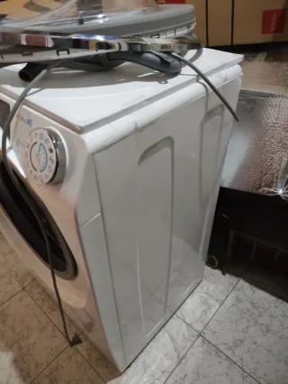 Lavadora Candy PUERTA ROTA mod. RO 1496DWHC7/1-S 1