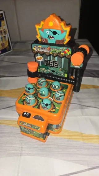 Juego de golpear topos Zombie War