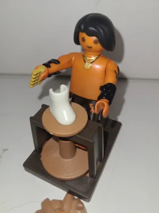 Lote 143. Zapatero playmobil