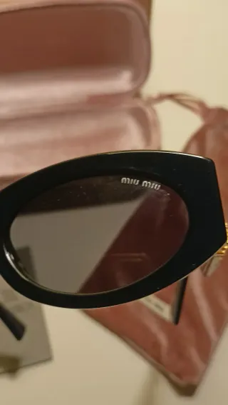 Occhiali Miu Miu Glimpse Nero/Oro