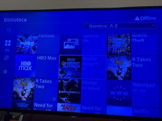 PS4 (PlayStation 4) con 2 mandos y juego