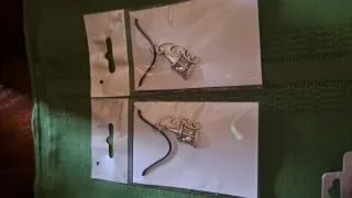 Collar con jaula y pajarito