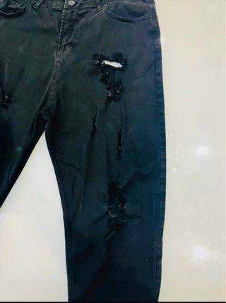 pantaloni neri strappati tg 46