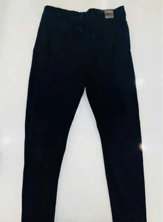 pantaloni neri strappati tg 46