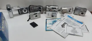 Consegna di Fotocamere Digitali Olympus e Kodak