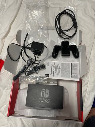 Nintendo Switch + Mando switch Pro + Lote Juegos
