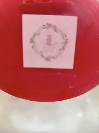 Candela decorata con pettirossi