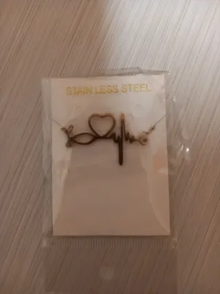 Colgante acero inoxidable estetoscopio corazón