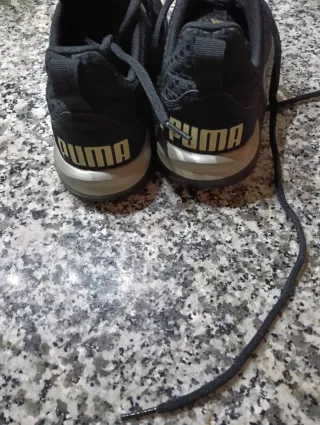 Lote 2 pares zapatillas Puma negro/dorado