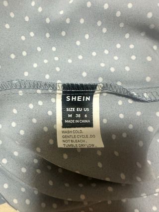 Maglietta azzurra a pois taglia M