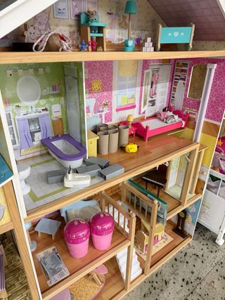 Casita de madera para muñecas