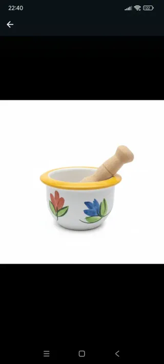 Mortero de cerámica con mazo de madera