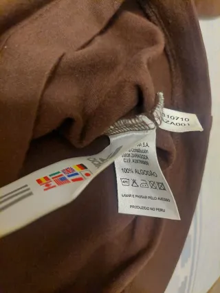 Polo Adidas manga larga marrón y naranja