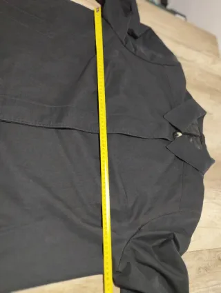 Gabardina negra talla XXXL.