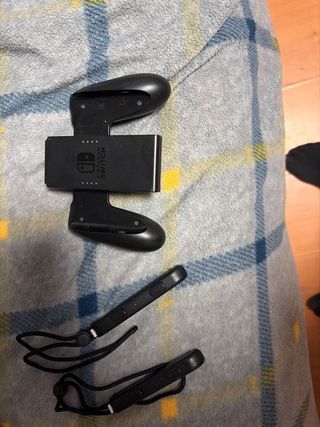 Nintendo Switch con fundas mando y caja,negociable
