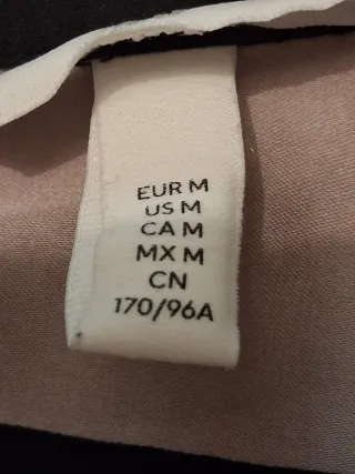 Camisa de rayas beige y negra