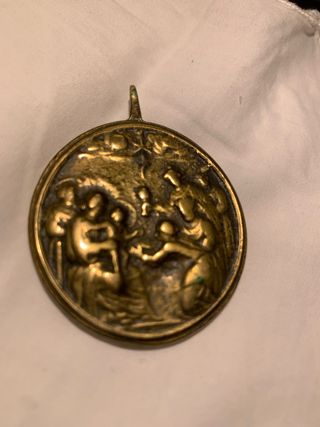 Medalla antigua de bronce