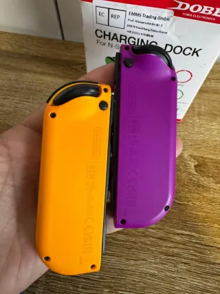 Par de joycons originales Nintendo + base de carga