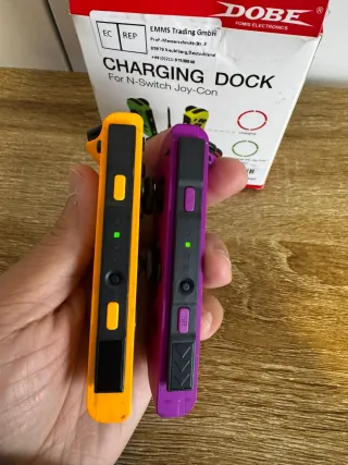 Par de joycons originales Nintendo + base de carga
