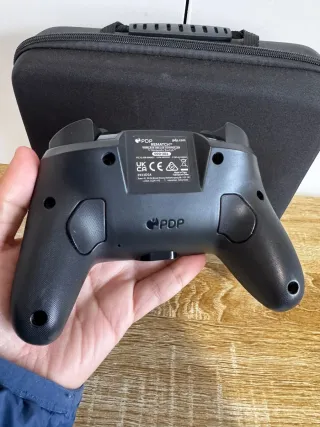 Mando Nintendo Switch Pro Super Mario + maleta