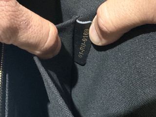 Borsa Christian Dior nera con dettagli oro