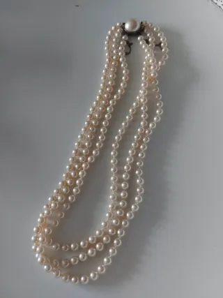 Collar de perlas triple