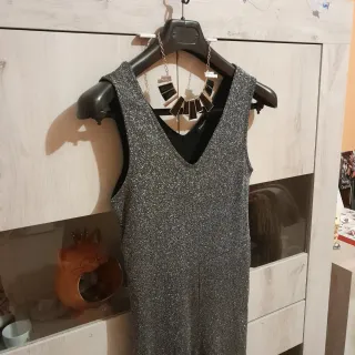 Tuta intera glitterata argento e nera più collana