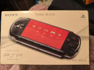 PSP 3004 Piano Black con caja y accesorios