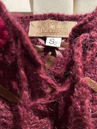 Top de lana tejido con flecos