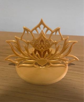 Lotús iluminado dourado - inclui vela-led.