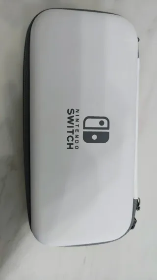 Nintendo Switch Lite + Zelda Breath of the Wild +