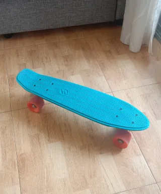 Skate Penny Azul con Ruedas Naranjas