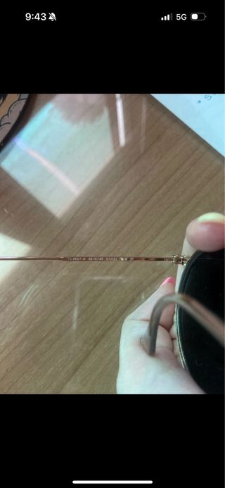 Gafas de sol Ray-Ban doradas y negras