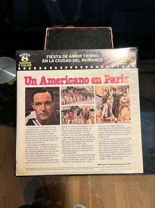 Súper 8 Cantando bajo la lluvia, y Americano París