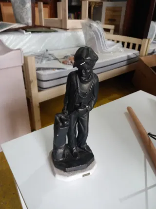 Figura decorativa de piedra