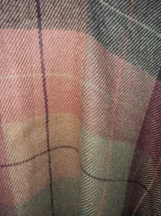 Capa de lana con cremallera