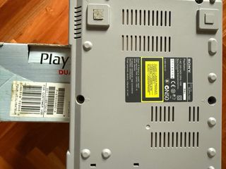 PlayStation 1 Dual Shock gris