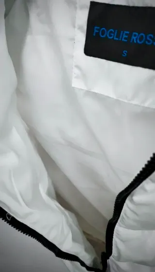 Chaleco acolchado blanco sin mangas