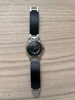 Reloj Swatch Negro y Plateado