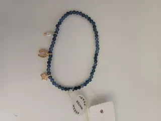 Pulsera Parfois azul y dorada