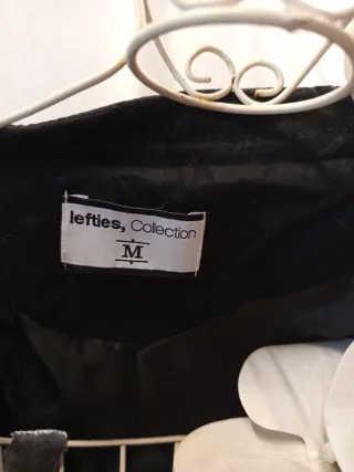 Chaqueta negra con botones