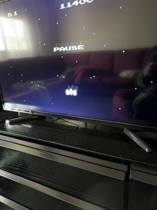 Consola Clónica Gris 90s retro funcionando