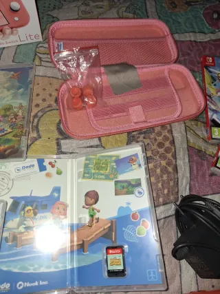 Nintendo Switch Lite rosa + 3 juegos físicos