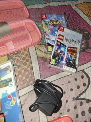 Nintendo Switch Lite rosa + 3 juegos físicos