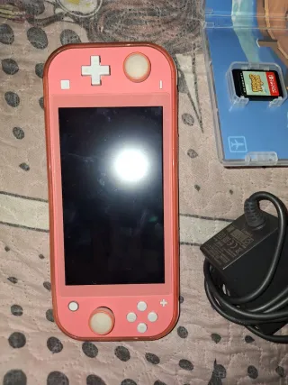 Nintendo Switch Lite rosa + 3 juegos físicos