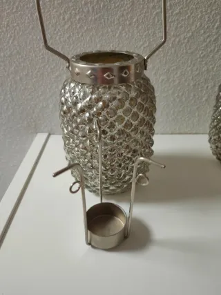 Candelabro de cristal plateado con asa