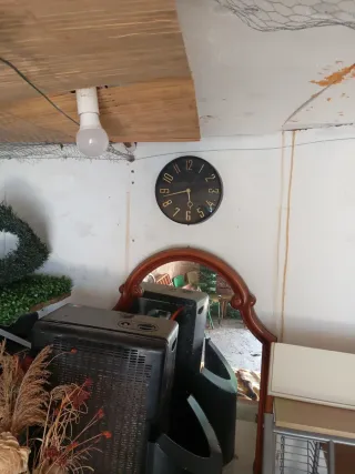 Reloj de pared redondo negro