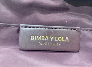 Bolso Bimba y Lola de color morado en buen estado