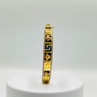 PULSERA RIGIDA MEDUSA ONIX GRECA Y CIRCON. Oro18K.